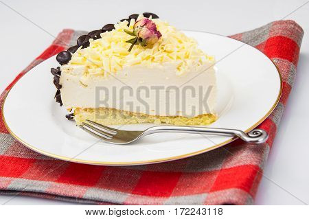 Cake piece Pigeon milk on plate. Stdio Photo