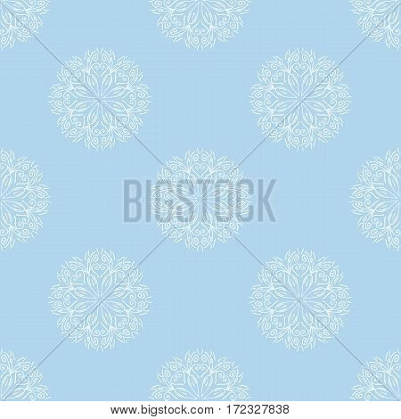 White floral motif on pale blue background. Repeating pattern ornament. Seamless background for webpages. Vector