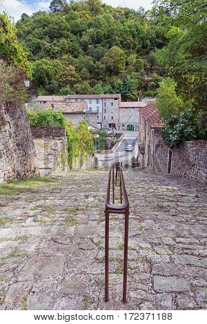Old staircase in the town of Largentiere in the Ardeche region of France