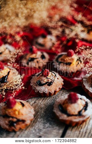 Delicious Chocolate Cupcakes With Berries On Wodeen Table, Top V