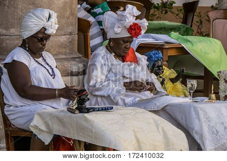 La Havana Cuba - December 26 2016: cuban portrait series two orisha's women on touristic place on street