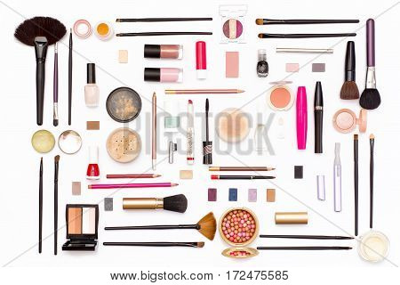 Makeup Cosmetics, Brushes And Accessories On White Background. Top View.