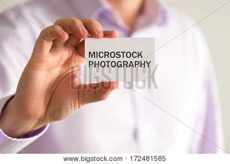Businessman Holding A Card With Text Microstock Photography
