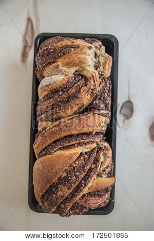 Home made Loaf of chocolate babka on a table