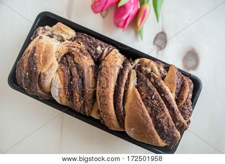 Home made Loaf of chocolate babka on a table