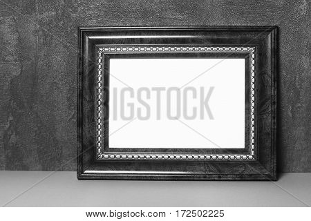 Vintage frame on table vintage background with space for text