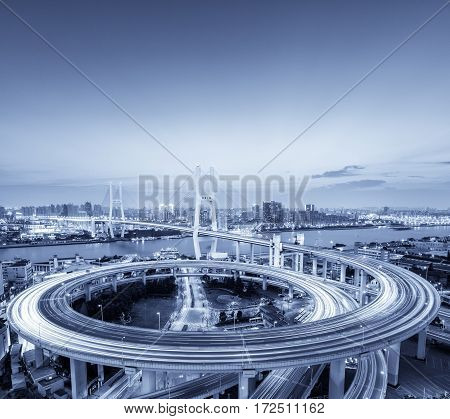 shanghai nanpu bridge in nightfall with blue tone