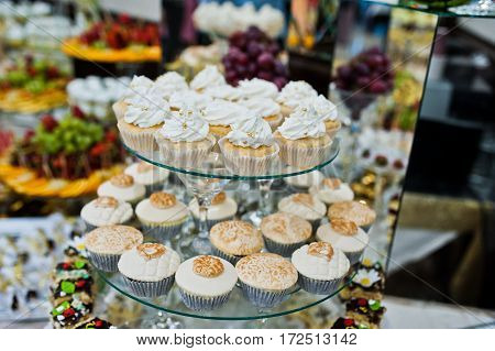 Different Swets And Cakes At Wedding Reception.