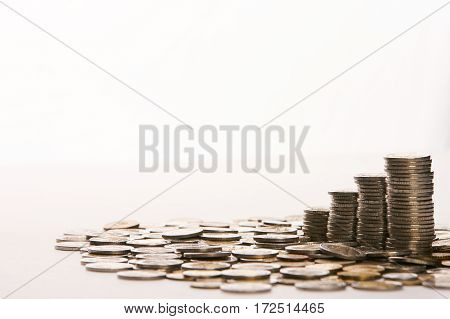 Saving coins money concept.coins money collect foe save on isolate background with copy space.