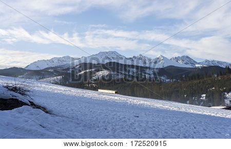 Winter mountains covered with snow view from a big meadow in Tatry mountains in Poland