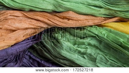 colored crinkled crumpled silk fabric textured for background