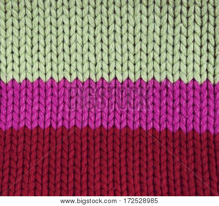 knitted colorful textured background includes 3 colors
