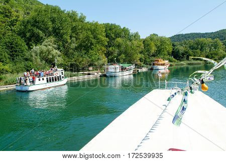 Tourists On A Boat At The River Who Takes To The Krka National Park