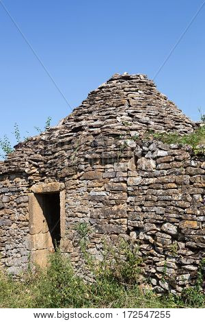 Old and typical stone hut in the vineyards of Beaujolais, France