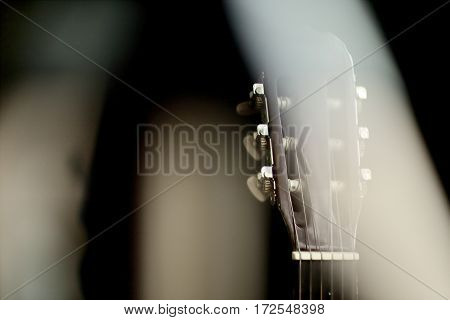 Neck Acoustic Guitar With A Beautiful Blur.
