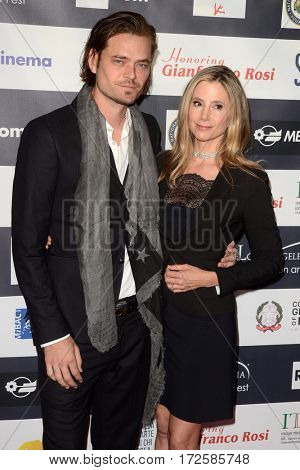 LOS ANGELES - FEB 19:  Christopher Backus, Mira Sorvino at the Los Angeles Italia Film Festival at the TCL Chinese 6 Theaters on February 19, 2017 in Los Angeles, CA