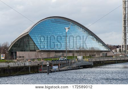GLASGOW, SCOTLAND - 31 JAN 2017: View of Glasgow Science Centre and IMAX Theatre from the River Clyde. The centre opened in 2001 and is now a major visitor attraction