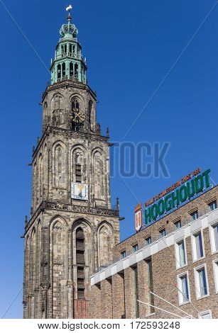 GRONINGEN, NETHERLANDS - FEBRUARY 15, 2017: Martini tower and Vindicat building in Groningen, Holland