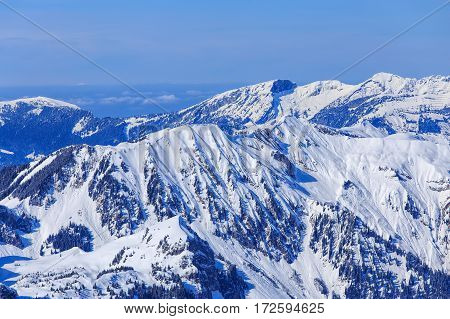 Wintertime view from Mt. Titlis in Switzerland. The Titlis is a mountain, located on the border between the Swiss cantons of Obwalden and Bern.