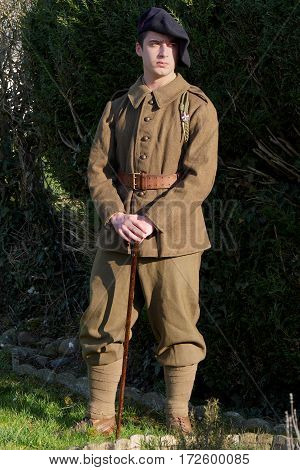 a french soldier in 1940's uniform outdoor
