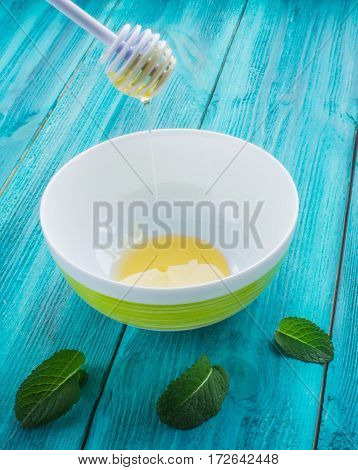 Dish With Honey And Spoon For Honey