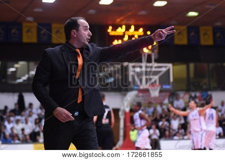 KAPOSVAR, HUNGARY - FEBRUARY 4: Ferenc Csirke (Pecs trainer) in action at Hungarian Championship basketball game with Kaposvar (white) vs. Pecsi VSK (black) on February 4, 2017 in Kaposvar, Hungary.