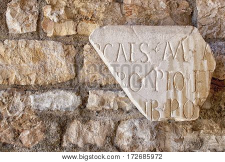 Latin inscritption on ancient stone Tarraco Tarragona.