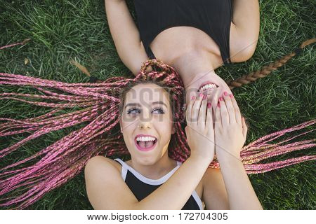 teen girlfriends playing to surprise each other