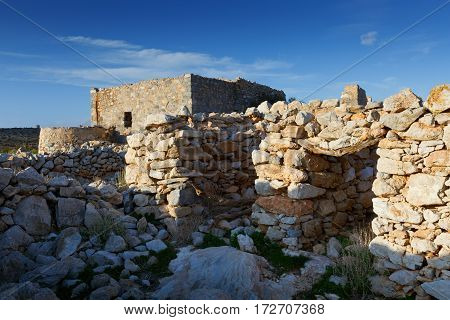 Castle over Livadi beach on Iraklia island in Lesser Cyclades, Greece.