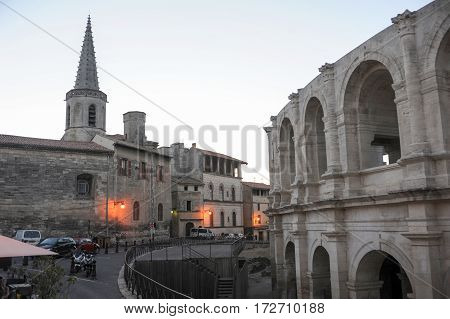 People Walking In Front Of The Amphithater At Arles