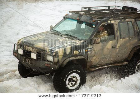 ALMATY, KAZAKHSTAN - FEBRUARY 21 2013: Off-road racing on jeeps Car competition ATV. Traditional race 