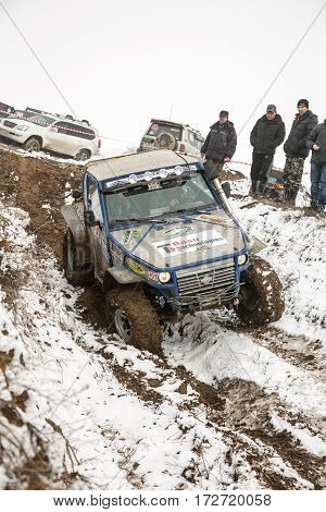 ALMATY KAZAKHSTAN - FEBRUARY 21 2013: Off-road racing on jeeps Car competition ATV. Traditional race 