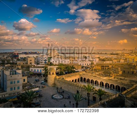 Beautiful sunset in Sousse, Tunisia. Cityscape with the view on Mosque and port of Sousse.