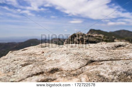 Balcony to the horizon of large stones