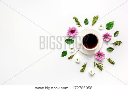 Froral flat lay with cup of coffee on white background top view mockup