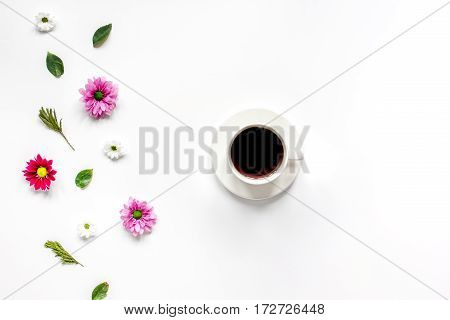 Froral flat lay with cup of coffee on white background top view mockup