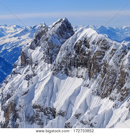 Alps, view from Mt. Titlis in Switzerland in winter. Titlis is a mountain, located on the border between the Swiss cantons of Obwalden and Bern.