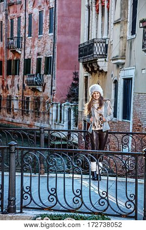 Happy Young Traveller Woman In Venice, Italy In Winter