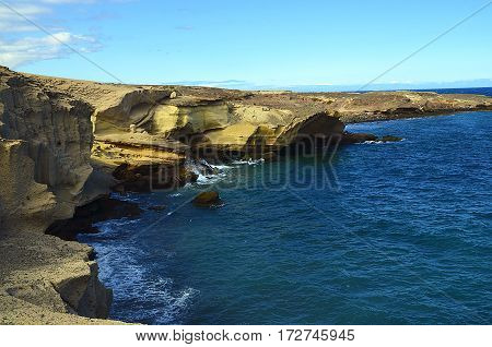 Rocky coastline of Tajao fishing village in the south of Tenerife,Canary Islands,Spain.