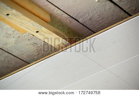 Installation of the ceiling of MDF panels