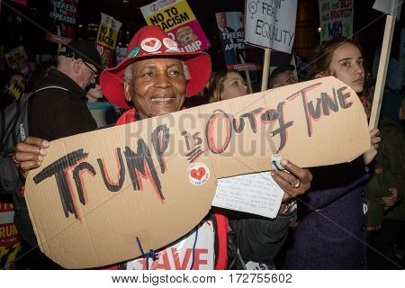 London United Kingdon - Febuary 20th 2017: Protesters gather in Parliment Square to protest the invitation to United States President Donald Trump on a state visit to Great Britain as Parliment debate the visit