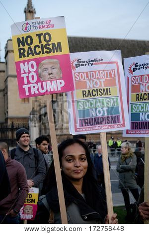 London United Kingdon - Febuary 20th 2017: Protesters gather in Parliment Square to protest the invitation to United States President Donald Trump on a state visit to Great Britain as Parliment debate the visit