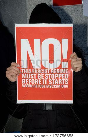 London United Kingdon - Febuary 20th 2017: Protesters gather in Parliment Square to protest the invitation to United States President Donald Trump on a state visit to Great Britain as Parliment debate the visit
