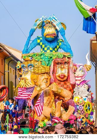 Cento Italy 19 feb 2017: Carnival of Cento satirical parade float Donald Trump as Tarzan between monkeys