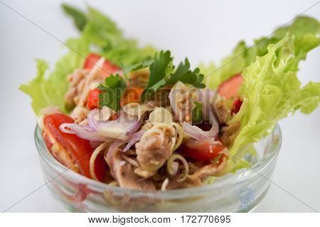 Salad tuna mix herbslemongrasstomatochilishallotlemon and vegetable.It's good for health and see close-up so delicious.
