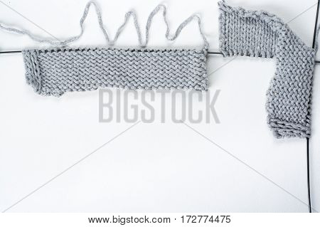 Knitted sweaters with knitting needles and wool hendmade