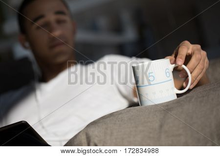 Mug Of A Man In His Living Room