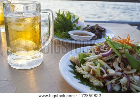 this is thaifoods hot and spicy with cold beer delicious in evening dinner