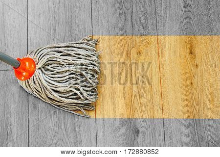 process of washing dust on wooden floor with mop