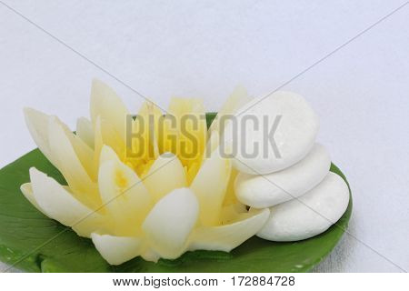 spa stil llife with lily candle,zen stone on the white background